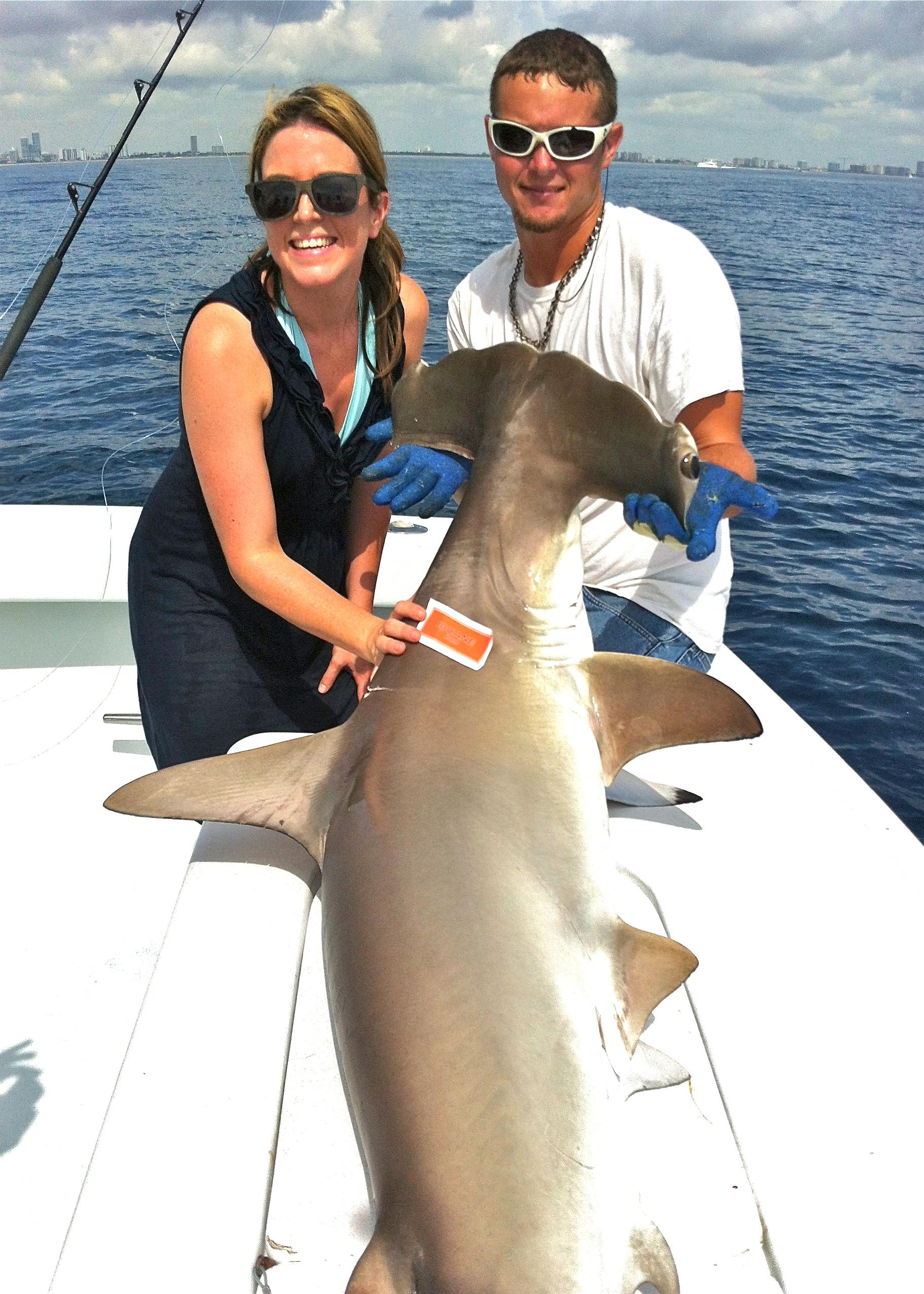 Lady Angler with Hammerhead Shark - Catch and Release