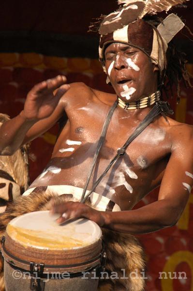 Drummer with Nii Tettey Tetteh & the Kusun Ensemble from Ghana at New Orleans Jazz Festival.