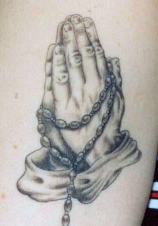 praying hands tattoo