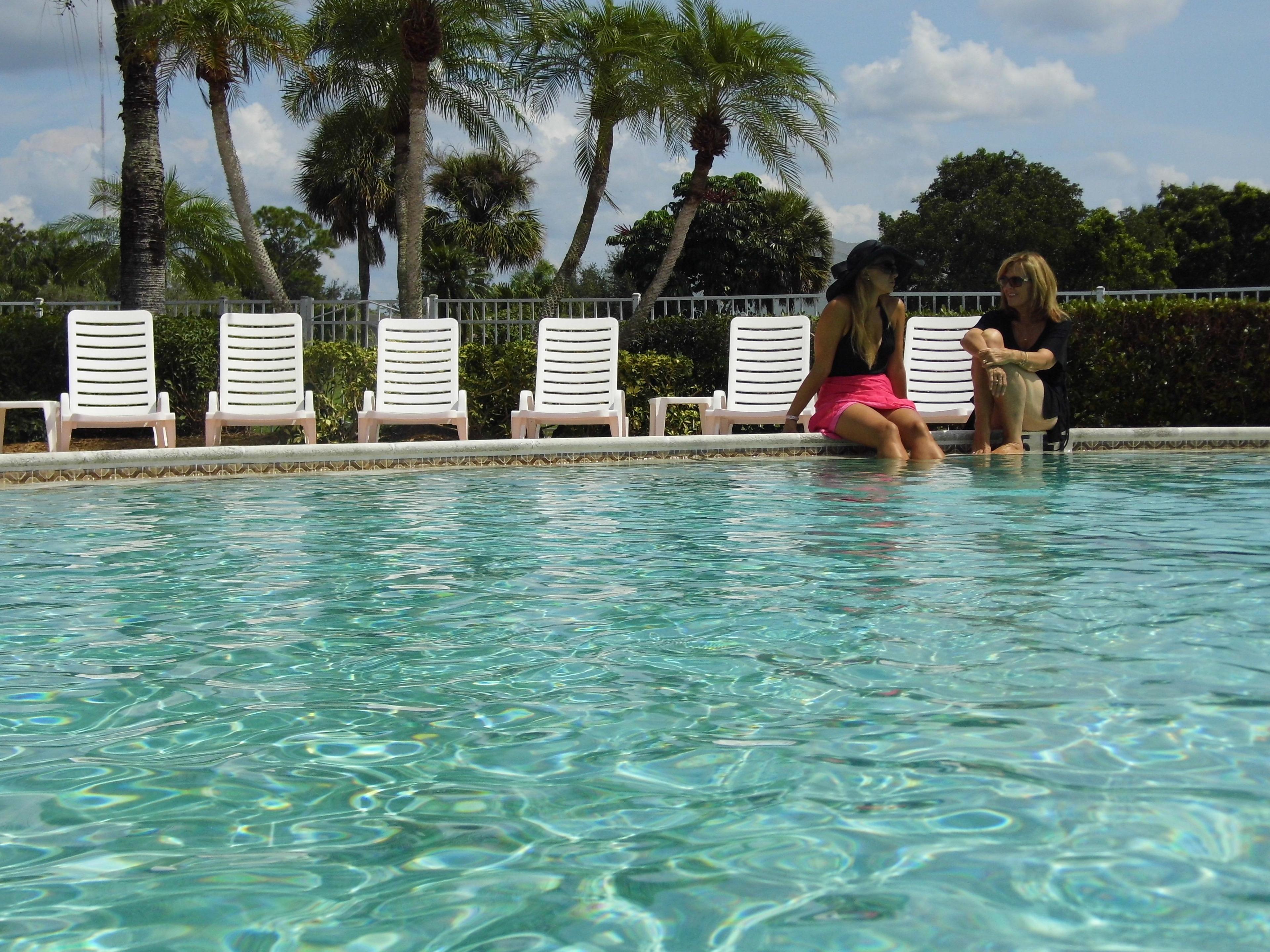 Dive in to relaxation at Spanish Wells Golf & Country Club's tropical heated pool.