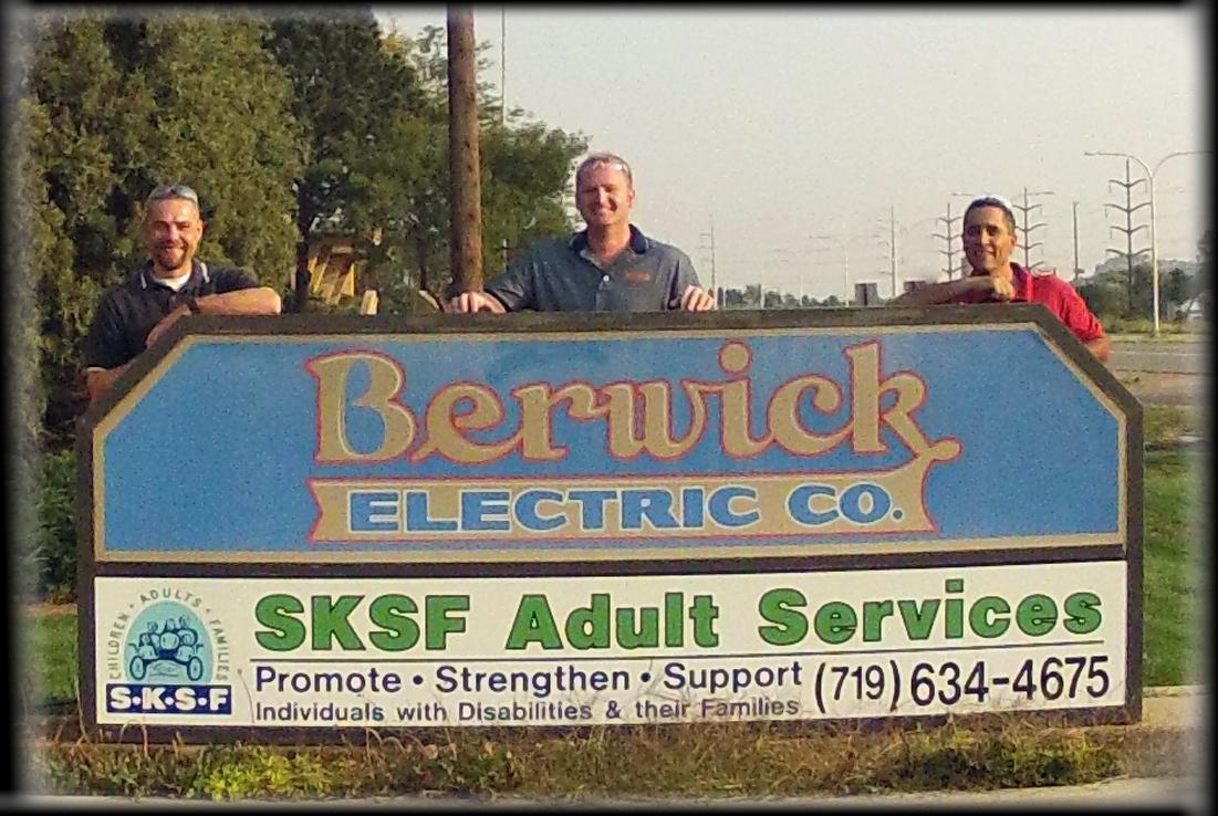 Service guys Billy, Matt & Buddy by front sign on N. Nevada Ave.