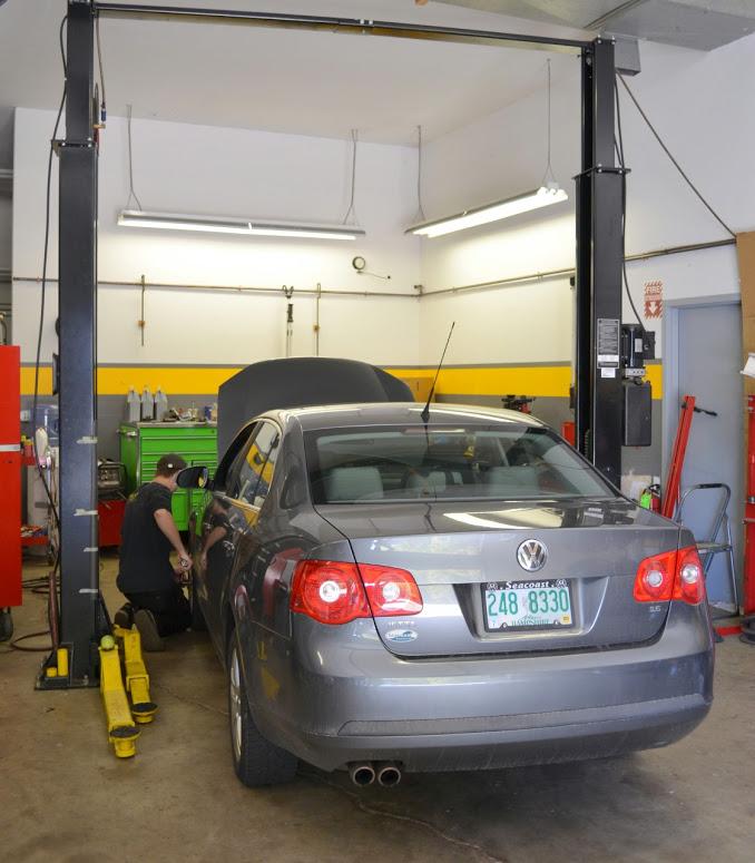 VW & Audi Service Bay #2. Our technician carefully torquing each wheel.