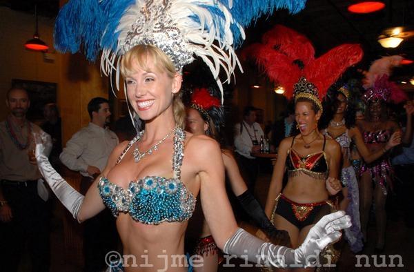 Mardi Gras-themed party in New Orleans featuring Stormy Gayle and Marggie Perez.