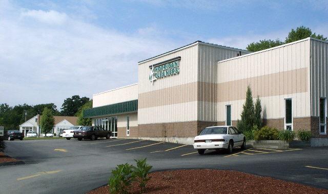 Large Sign on Front, Green Roof tops