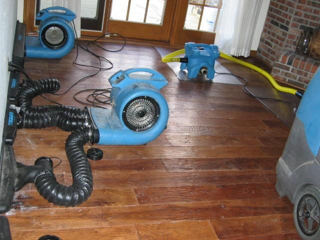 The dewatering process is best executed by a trained professional water damage restoration provider. Dehumidifiers are used to dry out materials.