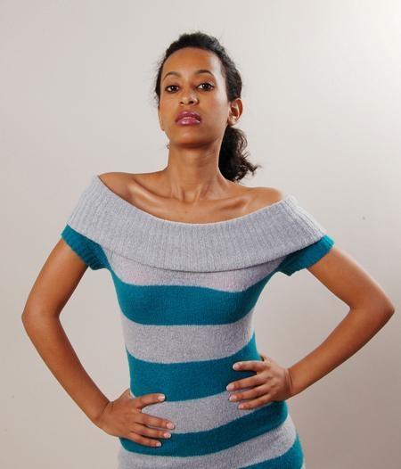 picture of a slim ethiopian model with striped dress