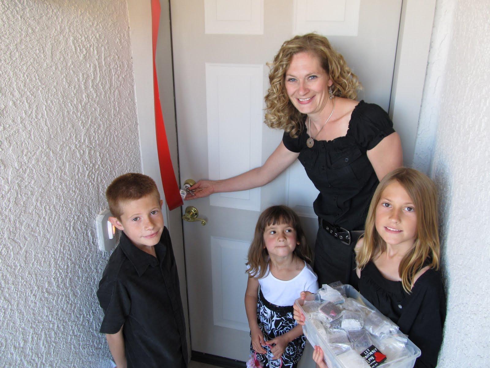 A Habitat family receives the keys to their first home!