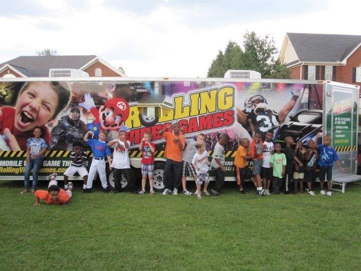 Happy Gamers in front of the Mobile Game Theater!