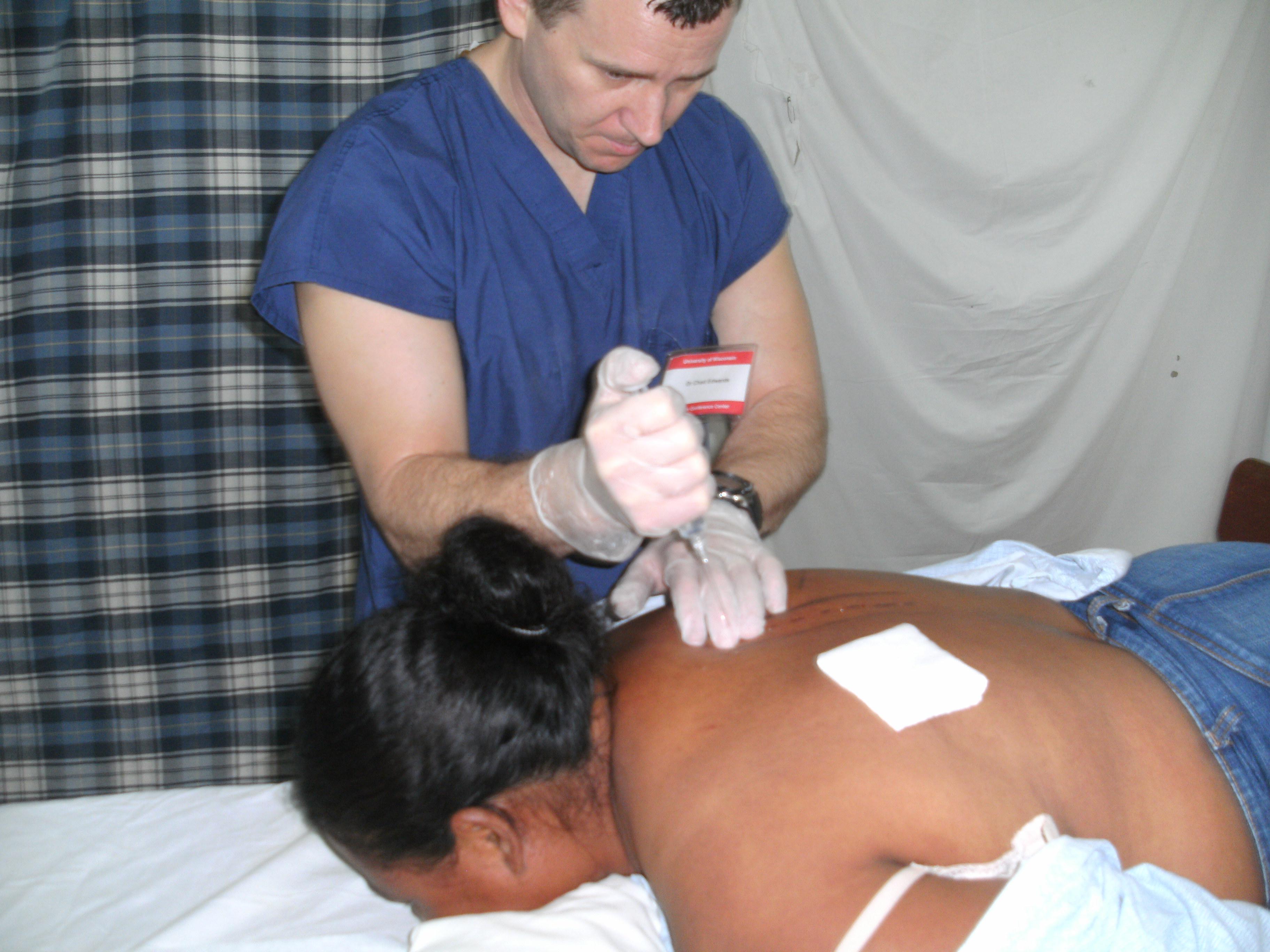 Dr Chad Edwards performing Prolotherapy in Honduras