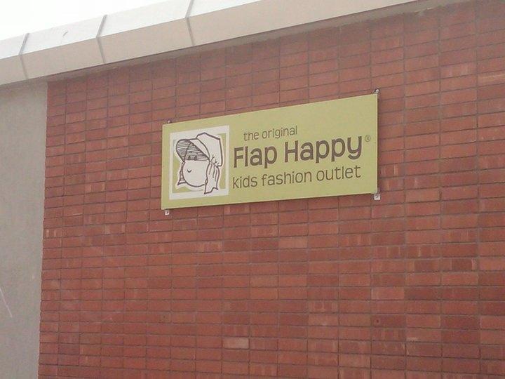 Look for the brick building with our bright green Flap Happy sign.