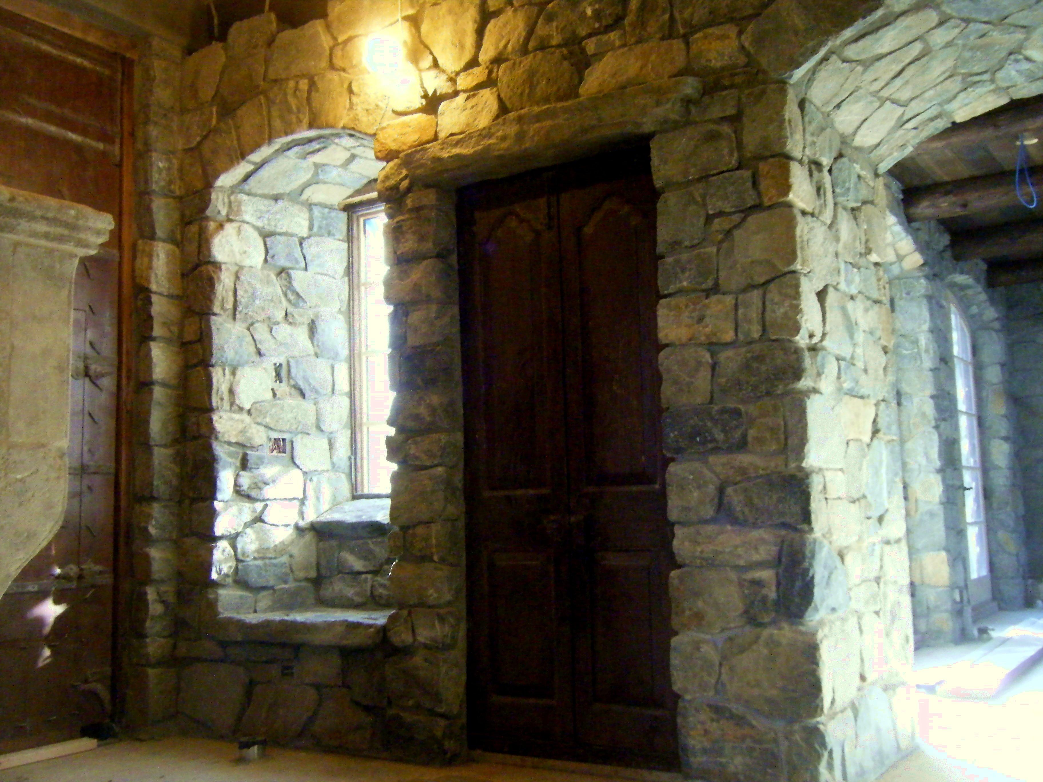 Sitting room with custom stone bench built in