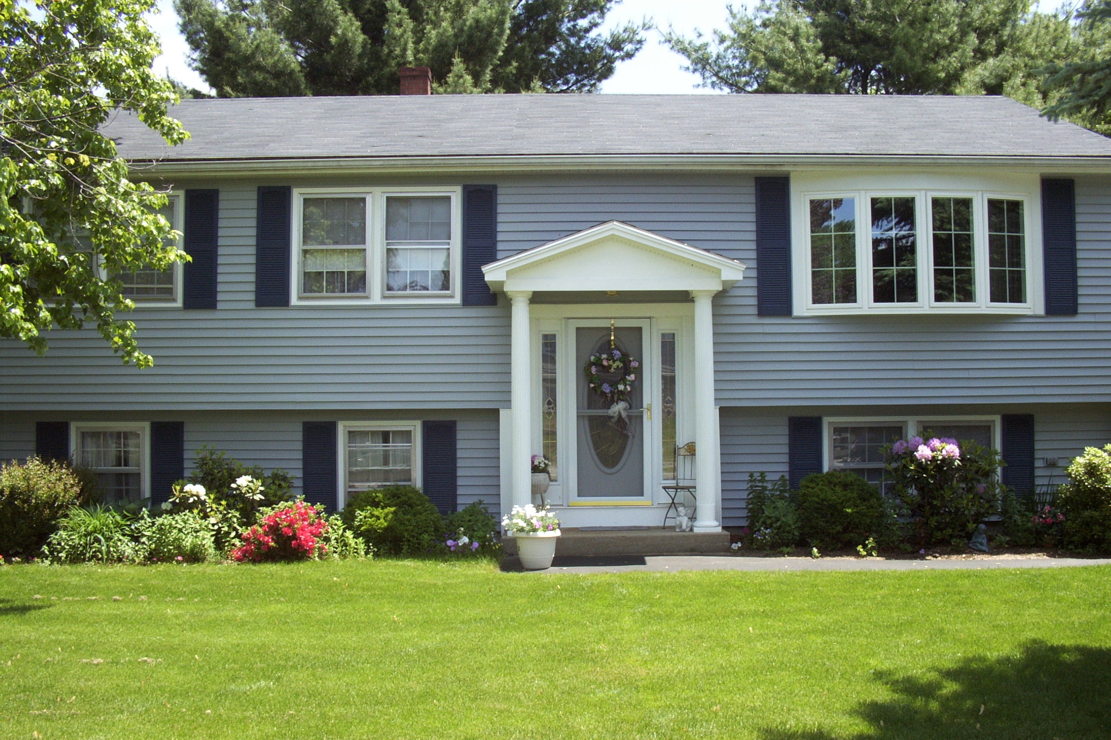 New Bow window, Awning and Siding.