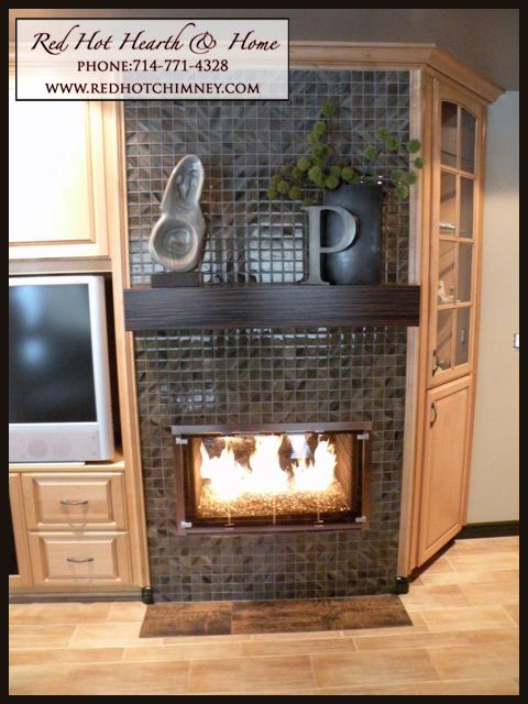 Fireplace remodel by Red Hot Hearth and Home