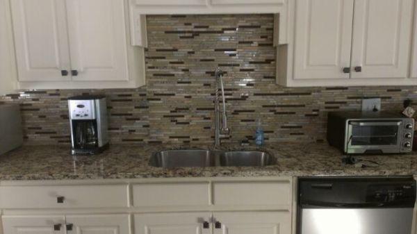 Santa Cecelia granite counter tops and Cronos back splash