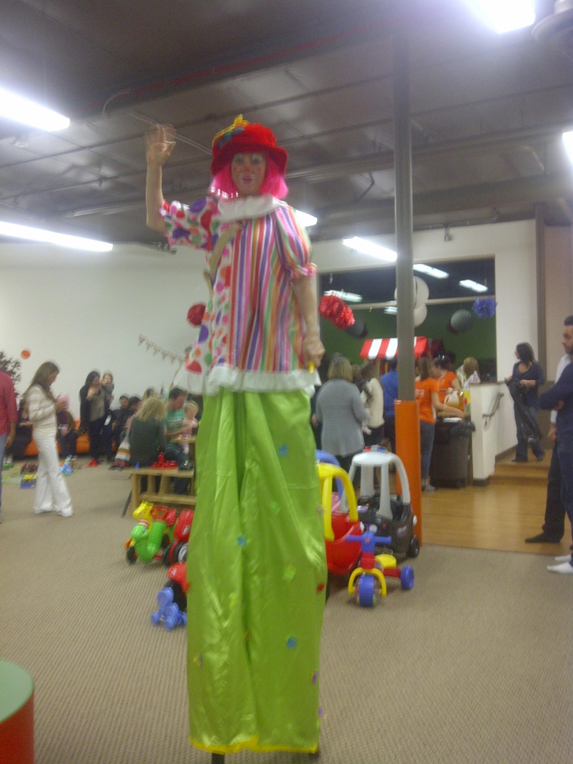 stilt walkers and jugglers and other circus performers