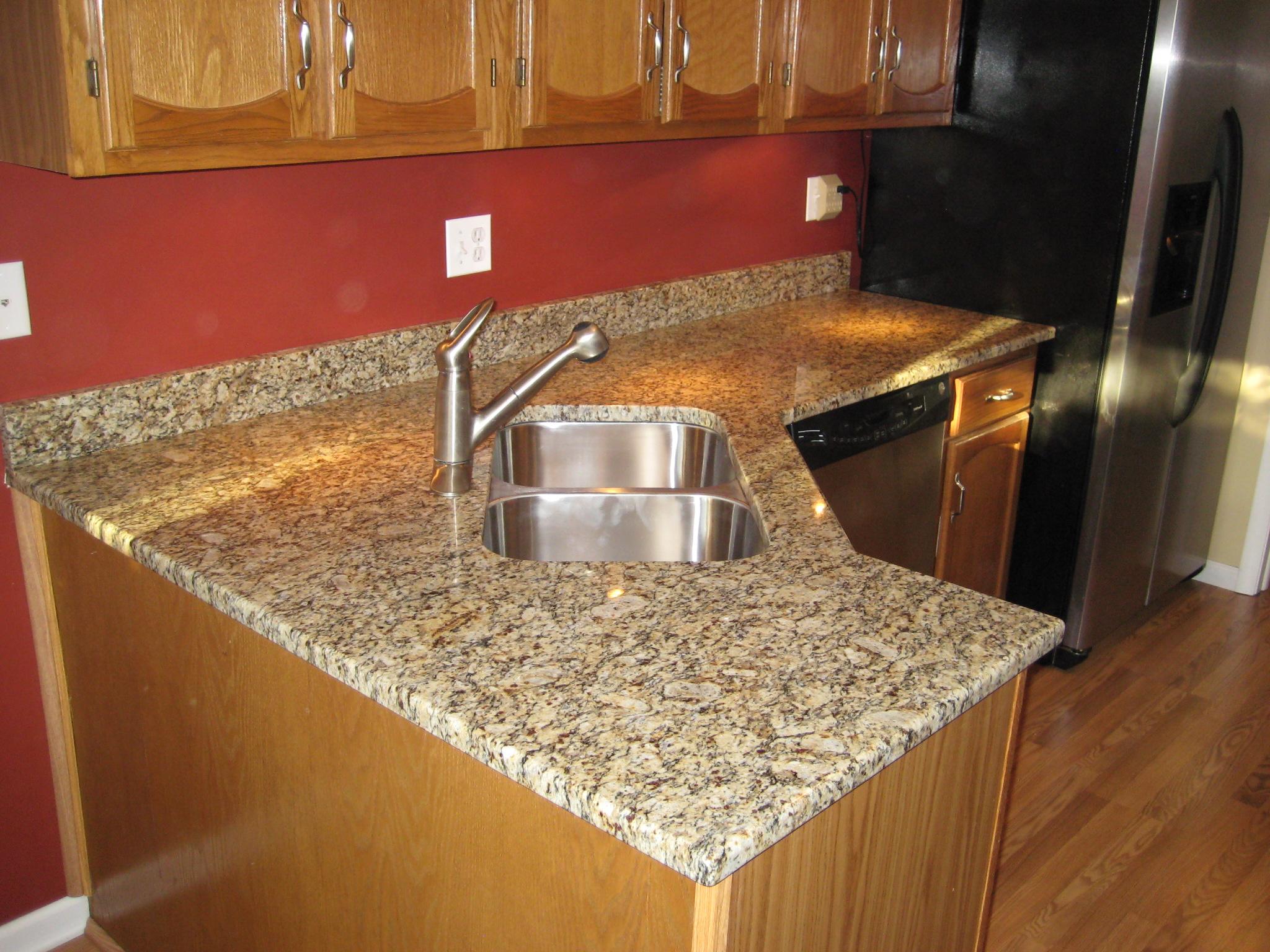 Kitchen with Granite Countertops done By Art Granite Countertops Inc.