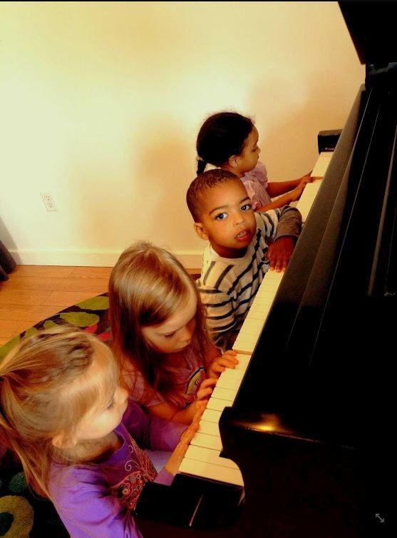 Kids playing piano