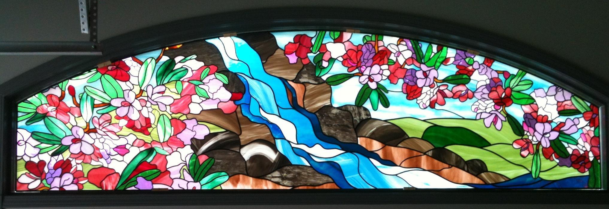 Floral waterfall in garage window.