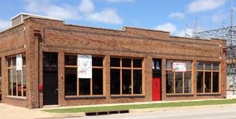 Across From Kamps 1910 on 10th Street before the railroad tracks.