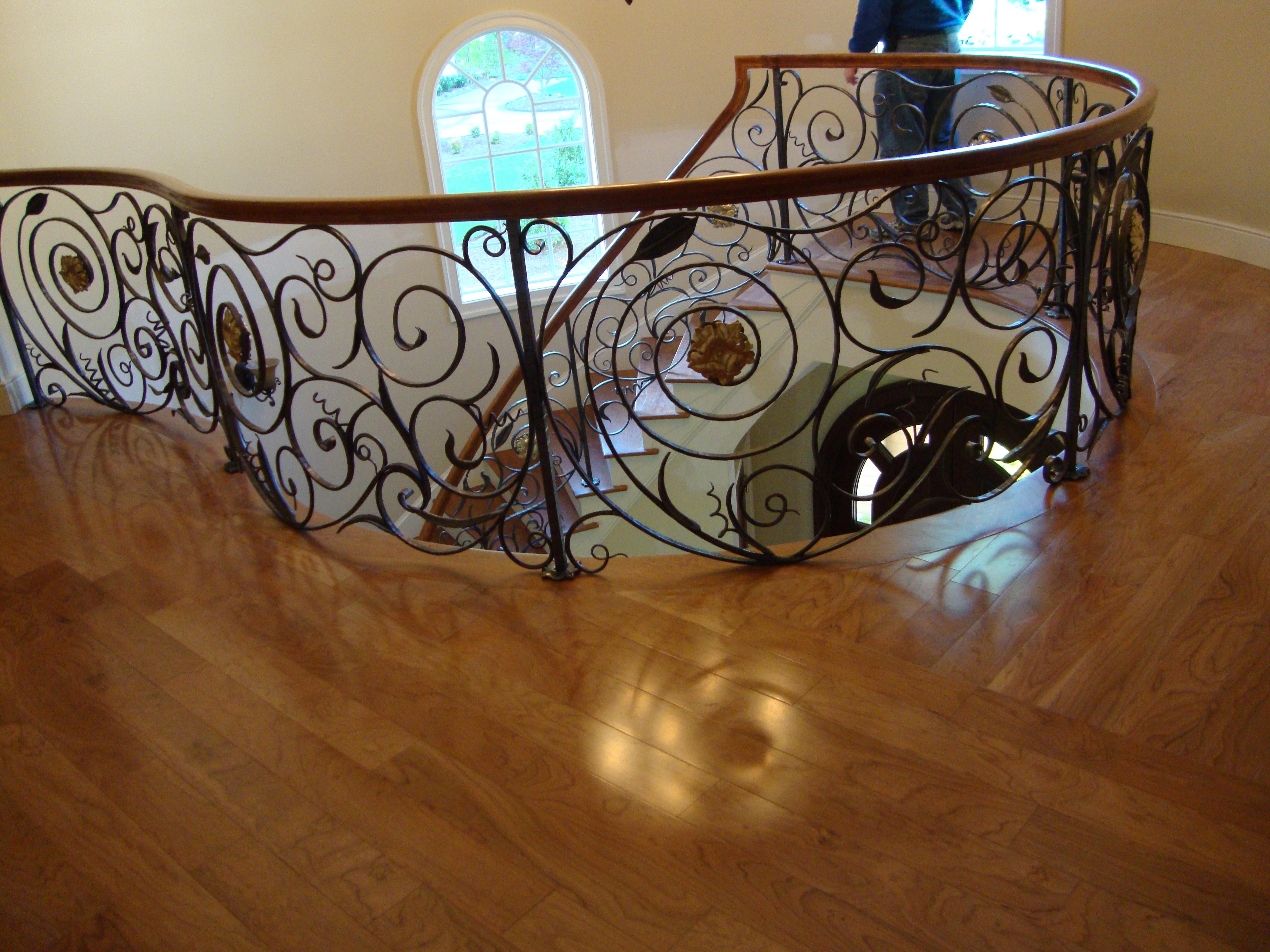 Hardwood floor upper hallway and staircase