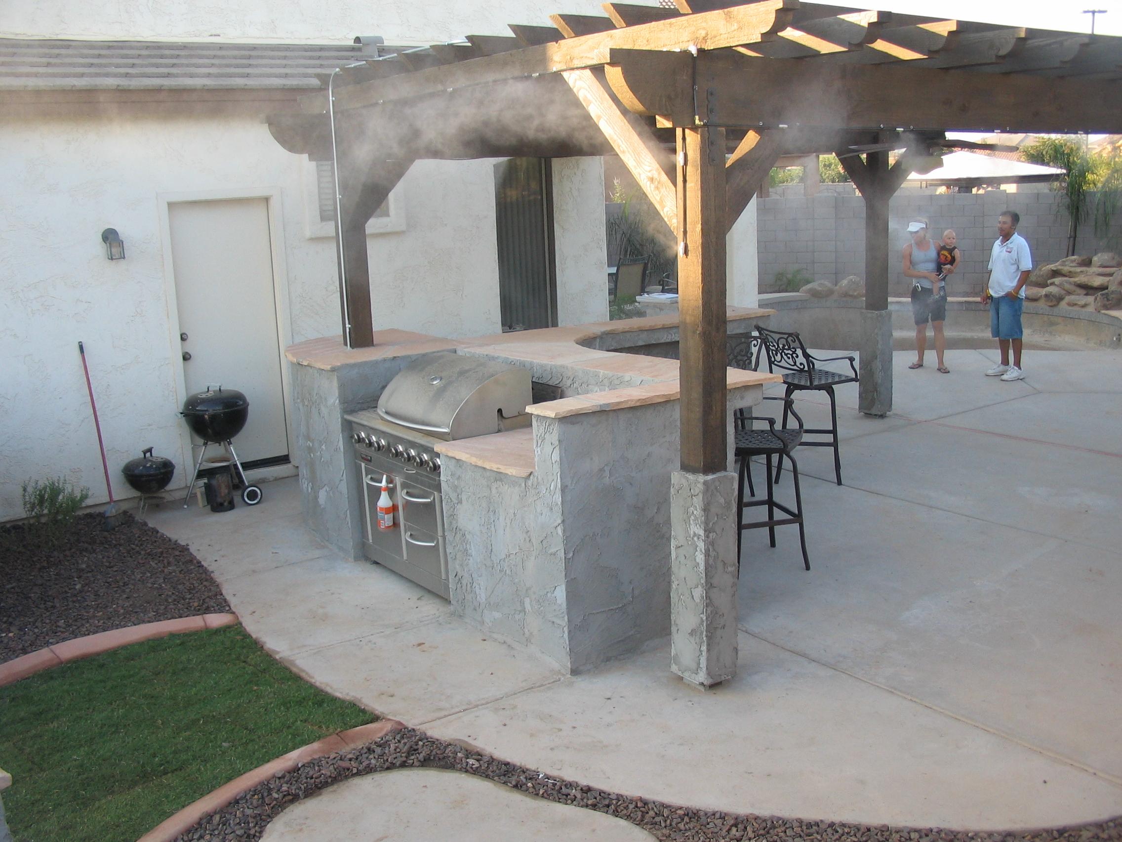 Built-in BBQ and misting system with fire pit