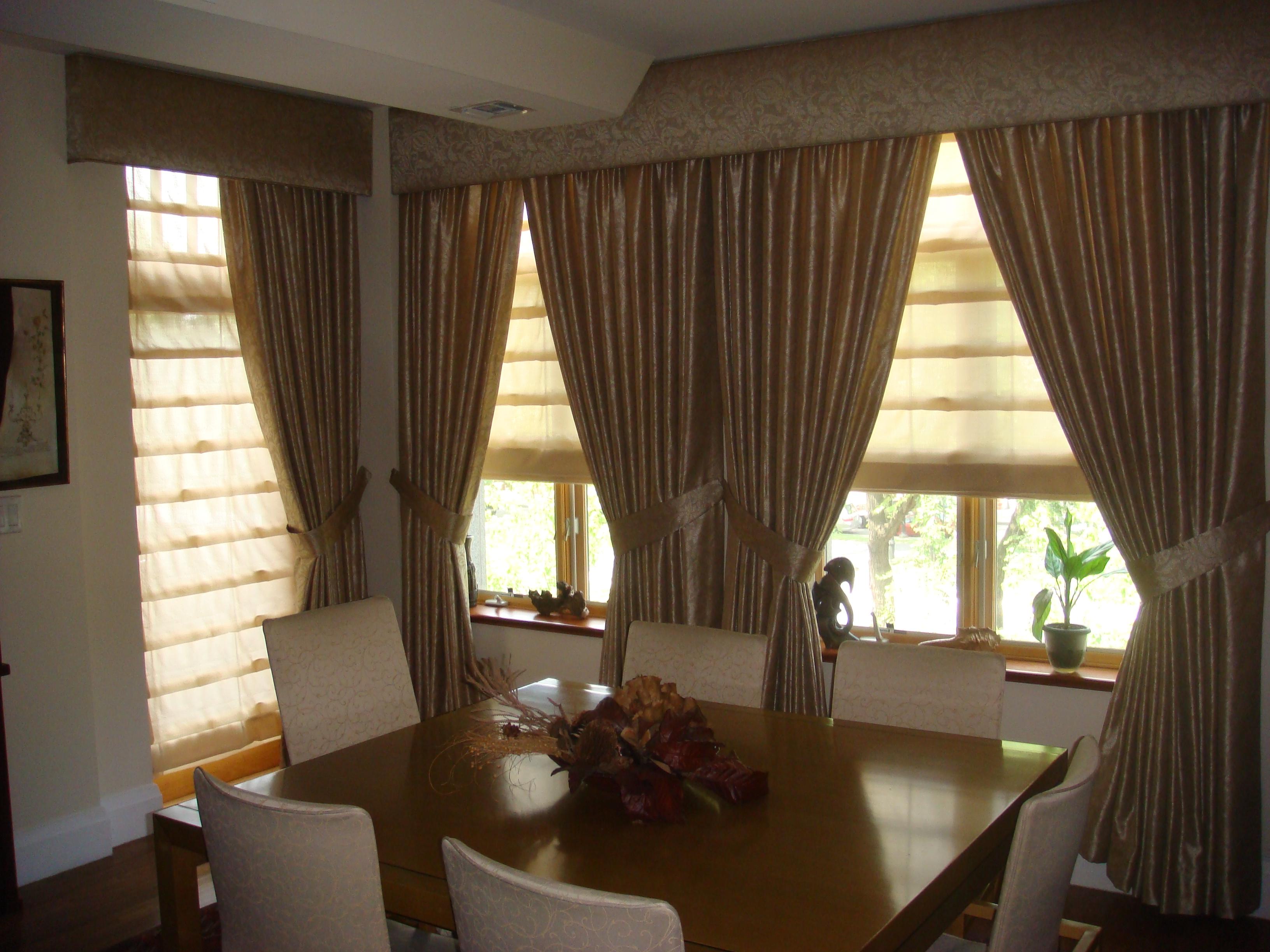 Drapery, upholstered cornice and unlined double roman shades