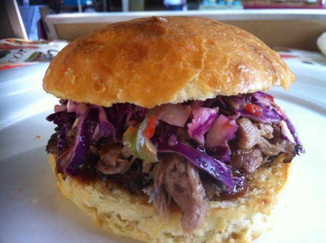 Happy's Smoked Pulled Pork Sandwich with Cajun Cole Slaw and BBQ Sauce