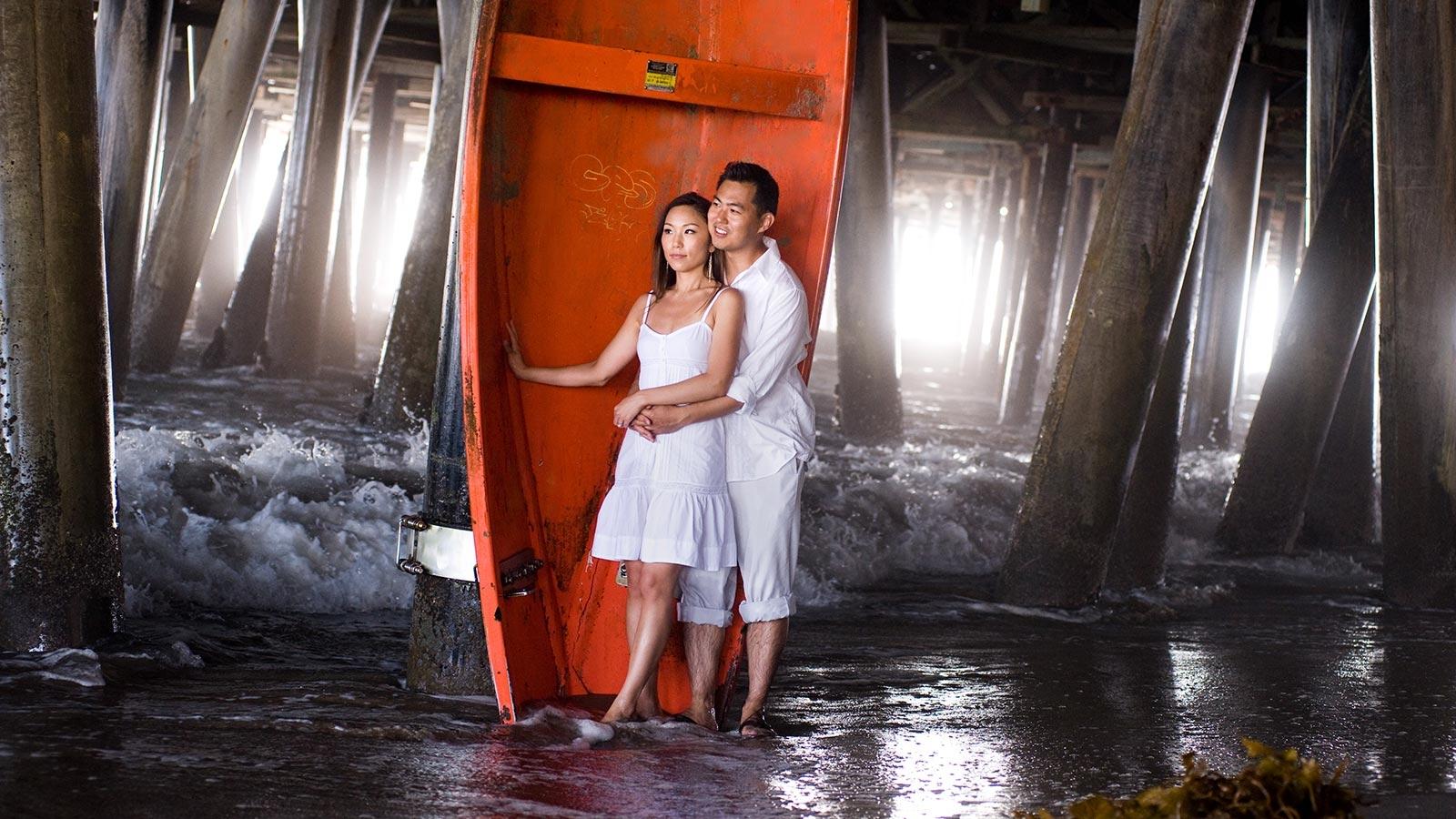 Couple's portrait at Santa Monica Pier in Los Angeles