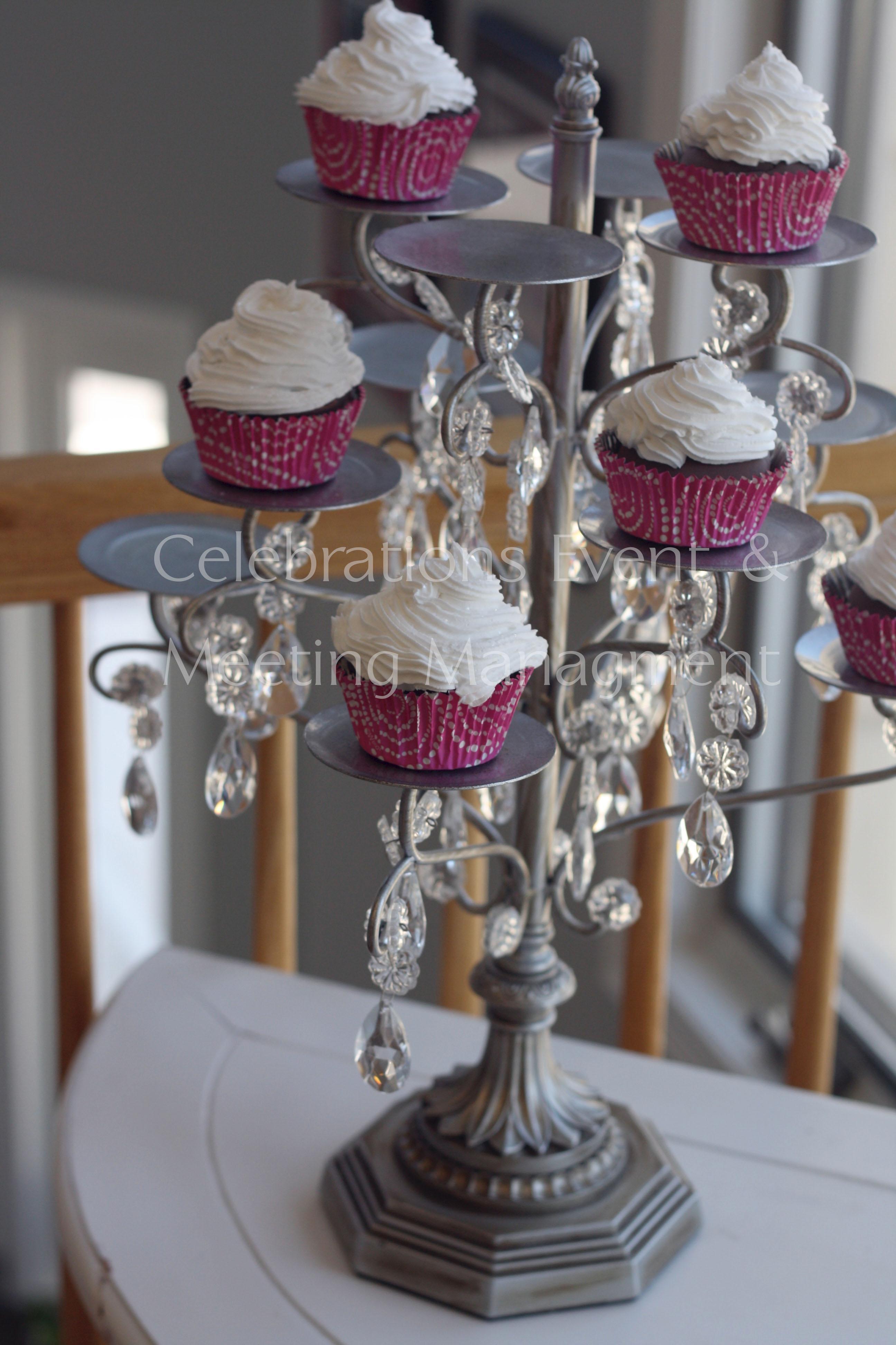 Deluxe Cupcake stand. Silver tone with faux crystal displays 12 cupcakes. Cupcakes not included.