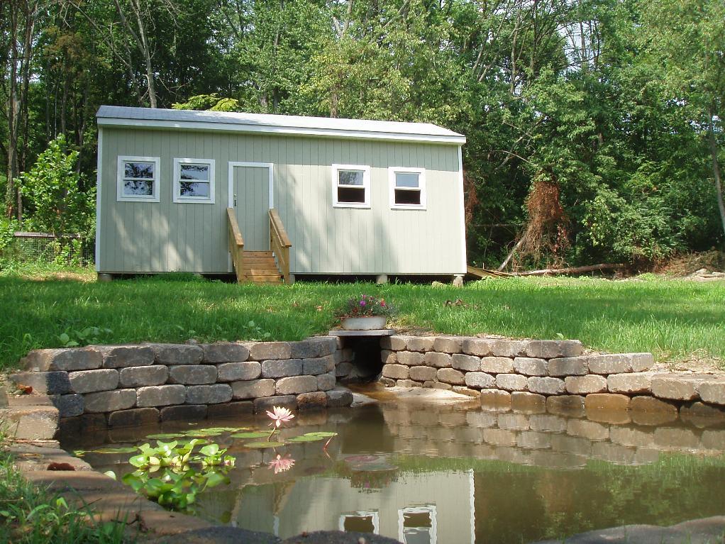 Custom outbuilding with workshop and shed storage