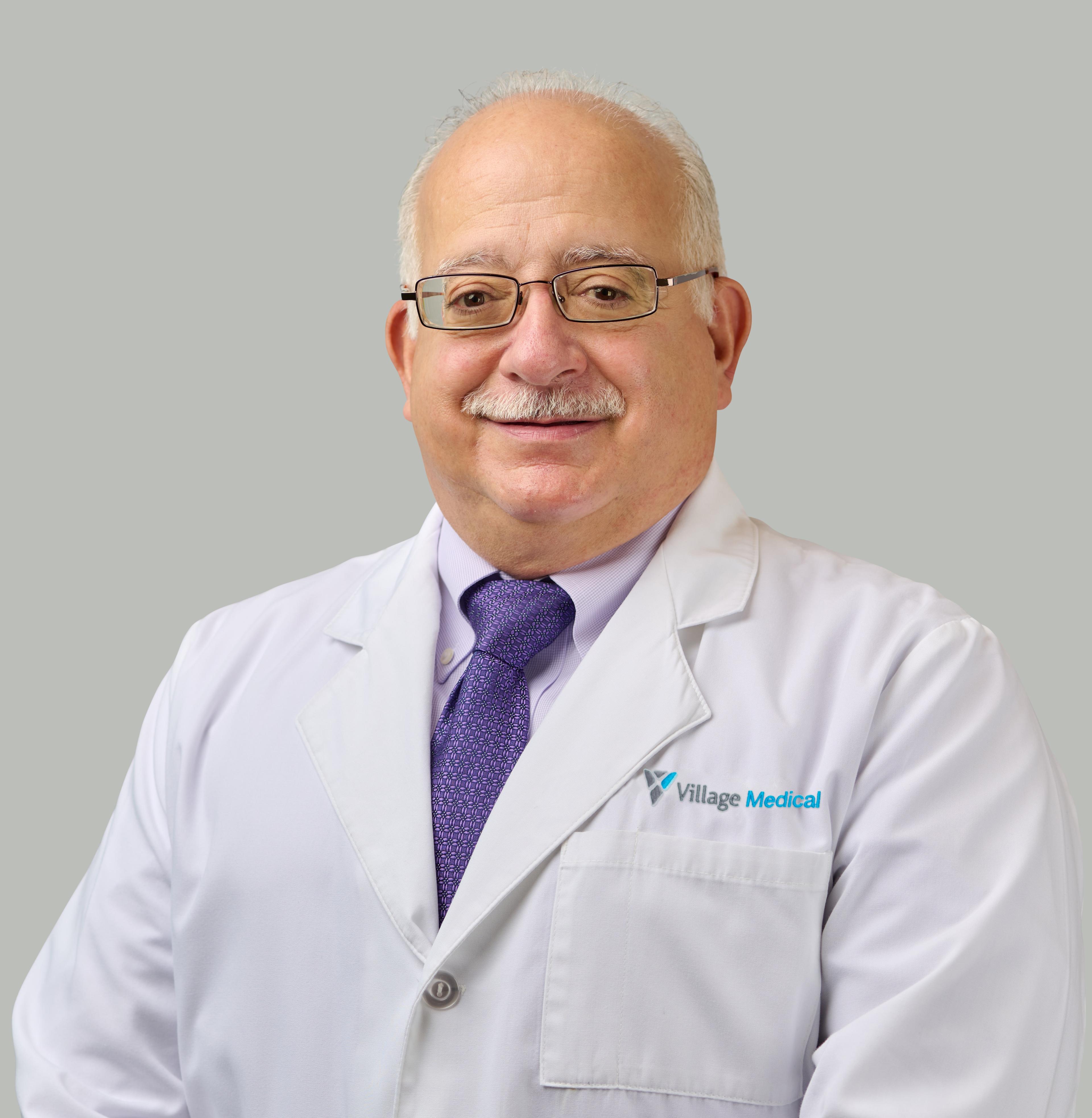 Luis Guerra, MD