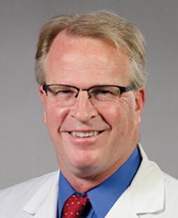 Mark E McDade, MD