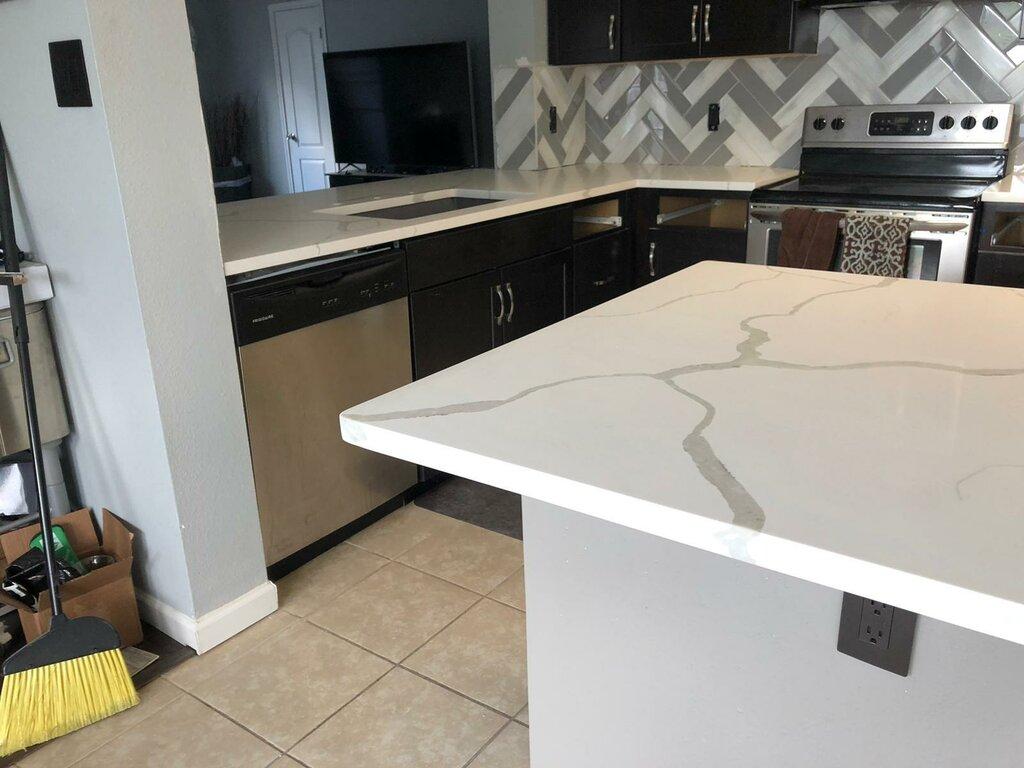 Mena Stone Surfaces - Quartz and granite countertops