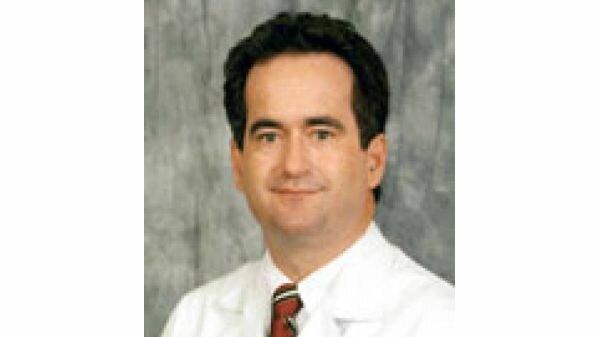 Keith A. Holmes, MD