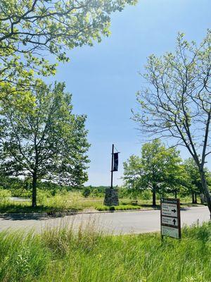 Parking lot next to beach, playground and shelter