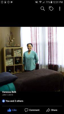 Vanessa in her massage room. Experience a place or peace, joy, healing, and restoration.