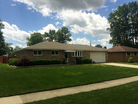 A complete tear off and asphalt shingle installation