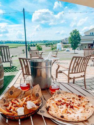 Truffle fries, rose, and Farmers Market Pizza