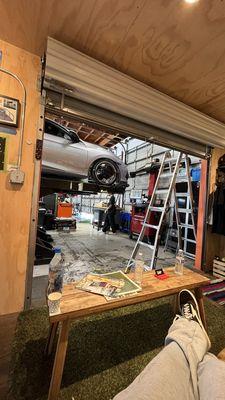 Waiting room area with a direct view of your car being worked on