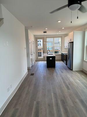 Our B1 floorplan has tons of natural light and space in both the kitchen and living room spaces!