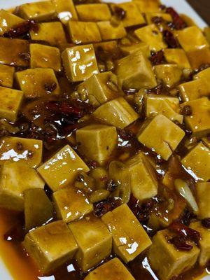 Mapo Tofu - if you like mala, this will be right up your alley.  If you don't, don't order this.