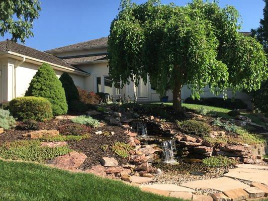 Series of waterfalls and weeping mulberry