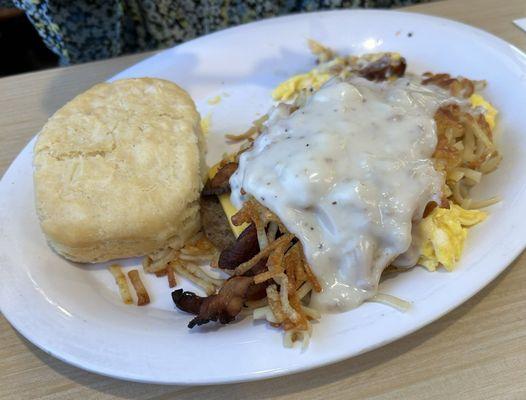 Sausage Egg with sausage gravy and a biscuit.