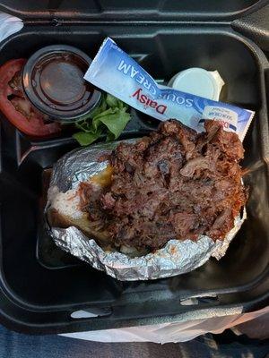 Chopped brisket baked potato. I think it was $13.99, March 2023.