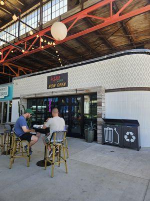 Store front and patio seating.