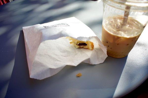 Chocolate croissant and iced lattee