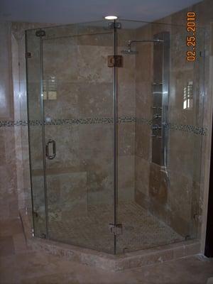 BATHROOM REMODEL.INCLUDES SHOWER WALLS, FLOOR IN CUSTOM TILE & CUSTOM GLASS SEAMLESS ENCLOSURE