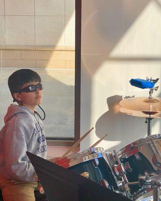 Feel the beat!  Discover the joy of drumming with personalized lessons for all ages. Start your rhythm journey today!