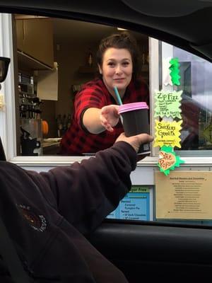 Barista Julia serving customers in Halloween