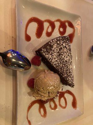 Gluten free chocolate cake with espresso gelato and berries